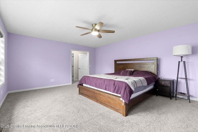 5651 Copper Creek Dr, Haslett, MI 48840 - carpeted bedroom featuring baseboards and ceiling fan