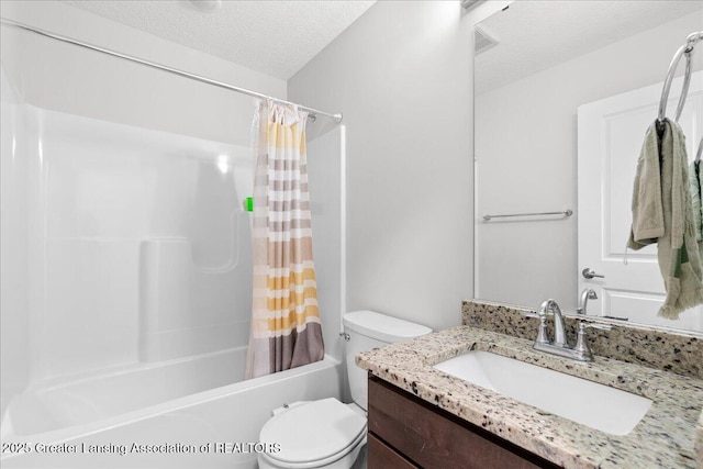 5651 Copper Creek Dr, Haslett, MI 48840 - full bathroom featuring a textured ceiling, shower / bath combo, toilet, and vanity