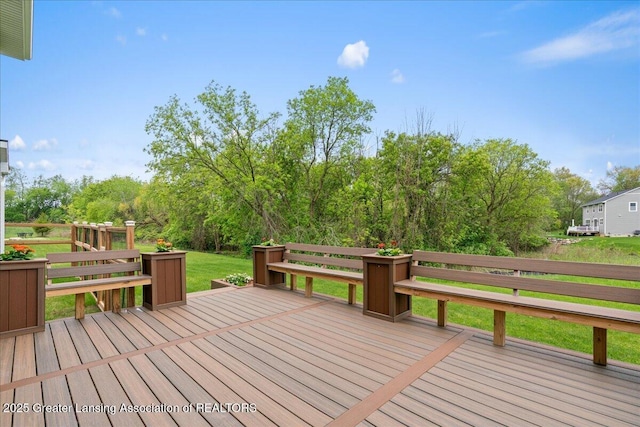 5651 Copper Creek Dr, Haslett, MI 48840 - wooden terrace featuring view of scattered trees