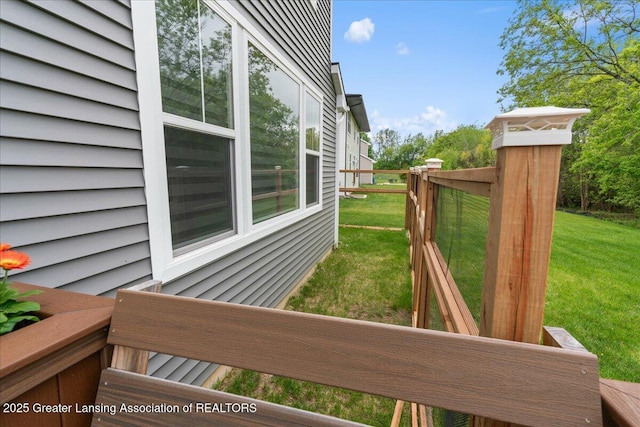 5651 Copper Creek Dr, Haslett, MI 48840 - wooden terrace featuring a yard