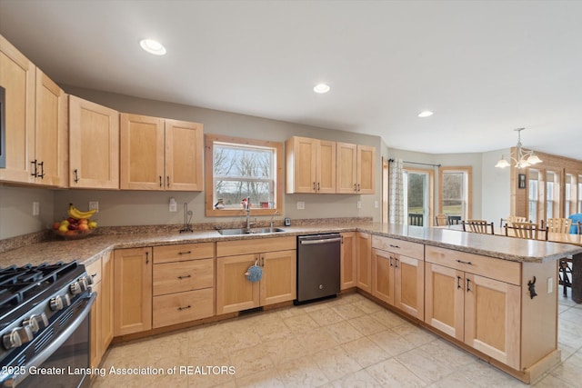 9671 Lakeside Dr, Perrinton, MI 48871 - kitchen with light brown cabinetry, appliances with stainless steel finishes, a sink, and recessed lighting