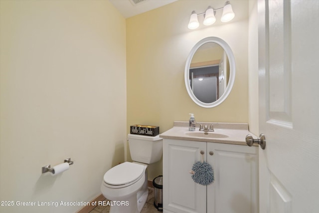 9671 Lakeside Dr, Perrinton, MI 48871 - half bath featuring toilet, vanity, and baseboards