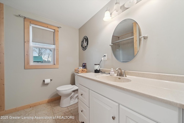 9671 Lakeside Dr, Perrinton, MI 48871 - bathroom with toilet, vanity, baseboards, a shower, and tile patterned floors