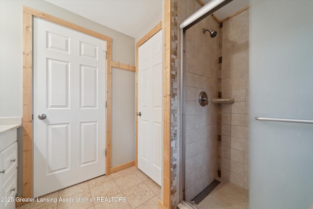 9671 Lakeside Dr, Perrinton, MI 48871 - full bath with a shower stall and tile patterned flooring