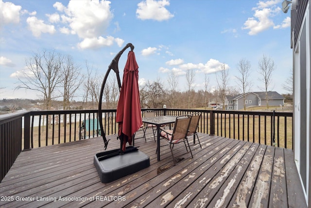 9671 Lakeside Dr, Perrinton, MI 48871 - deck with outdoor dining area
