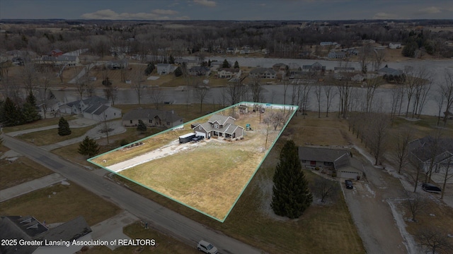 9671 Lakeside Dr, Perrinton, MI 48871 - aerial view of property and surrounding area featuring property boundaries highlighted