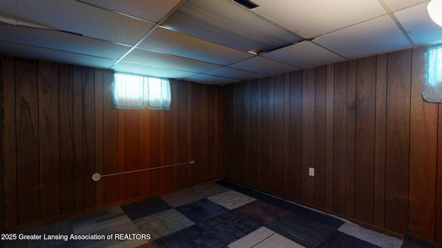5120 Wardcliff Dr, East Lansing, MI 48823 - finished below grade area featuring a paneled ceiling and wood walls