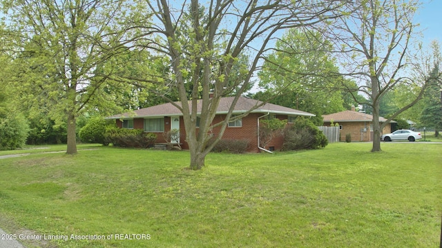 5120 Wardcliff Dr, East Lansing, MI 48823 - view of front of home with brick siding