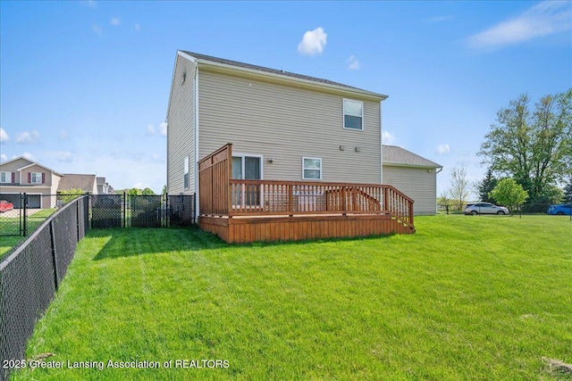 rear view of house with a deck
