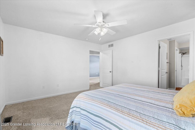 carpeted bedroom featuring baseboards and a ceiling fan