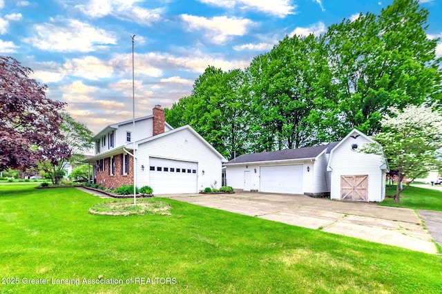traditional home with a front yard, an outbuilding, and a chimney