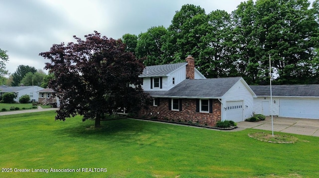 view of front of home with a garage, brick siding, and a front lawn