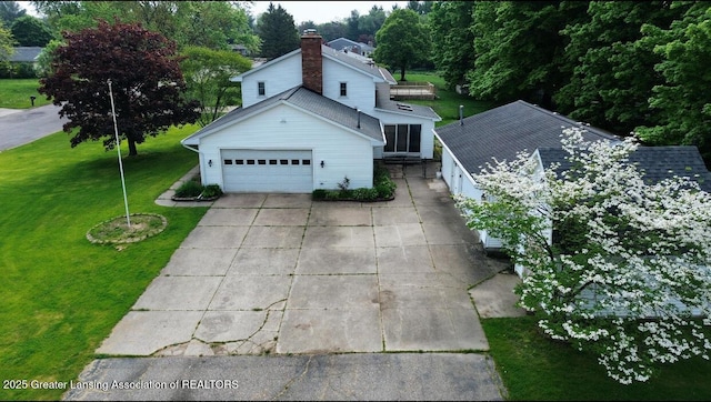 view of property exterior featuring an attached garage, concrete driveway, and a lawn