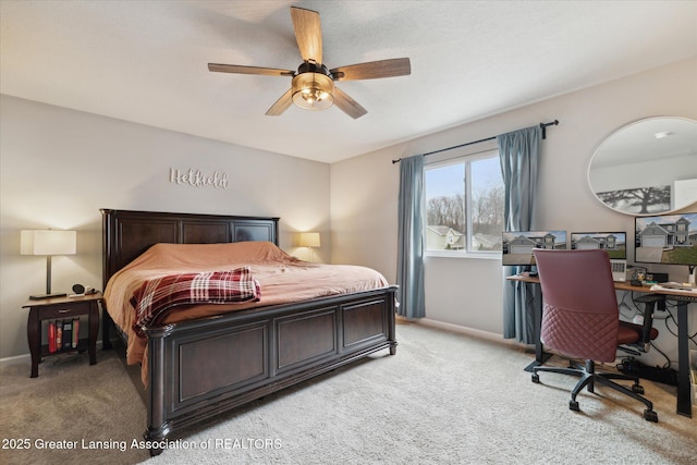 3793 Calypso Rd, Holt, MI 48842 - bedroom with light carpet, baseboards, ceiling fan, and an office area