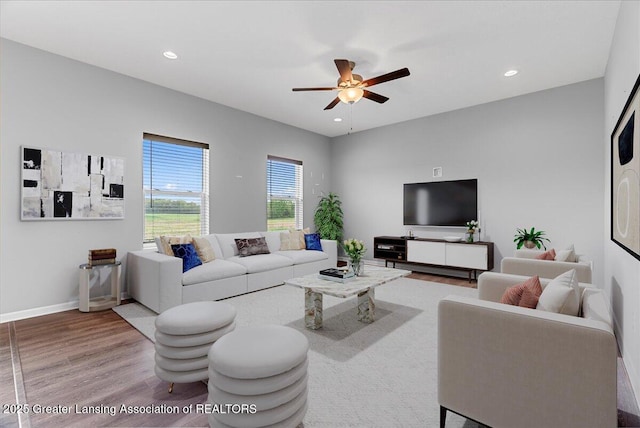 4535 Harper Rd, Holt, MI 48842 - living area with ceiling fan, wood finished floors, recessed lighting, and baseboards
