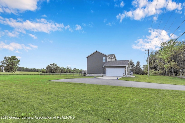 4535 Harper Rd, Holt, MI 48842 - view of home's exterior with asphalt driveway
