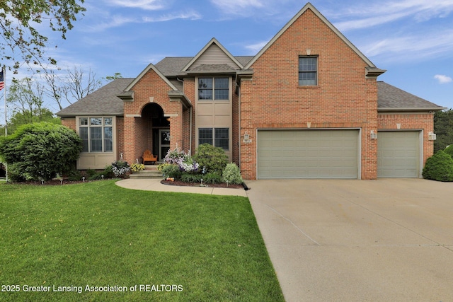 3650 Observatory Ln, Holt, MI 48842 - traditional-style home featuring brick siding, concrete driveway, a front lawn, roof with shingles, and an attached garage