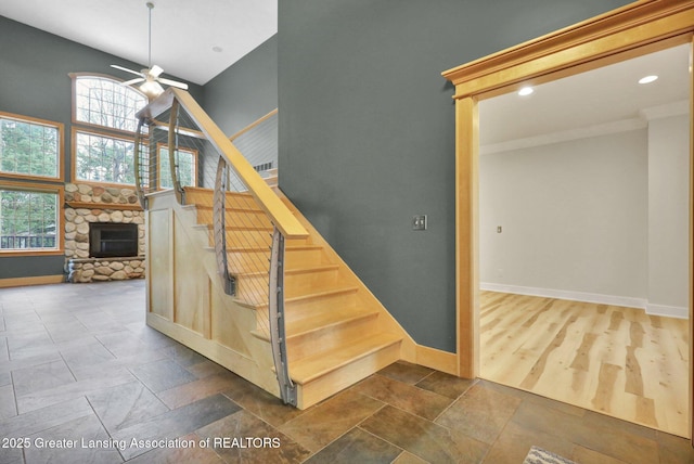 3650 Observatory Ln, Holt, MI 48842 - stairway with baseboards, ceiling fan, healthy amount of natural light, crown molding, and recessed lighting