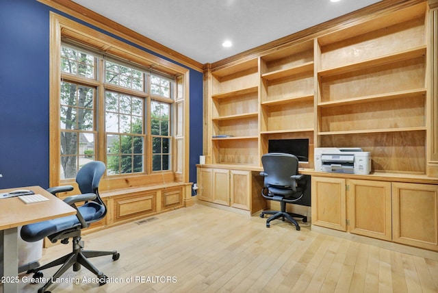 3650 Observatory Ln, Holt, MI 48842 - office area featuring built in desk, light wood-style flooring, recessed lighting, and ornamental molding