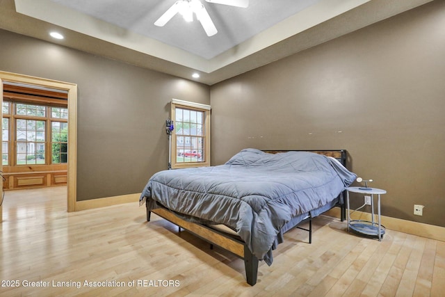 3650 Observatory Ln, Holt, MI 48842 - bedroom featuring light wood-type flooring, baseboards, recessed lighting, and multiple windows