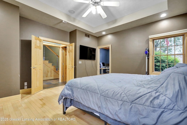 3650 Observatory Ln, Holt, MI 48842 - bedroom featuring wood finished floors, recessed lighting, ceiling fan, and baseboards
