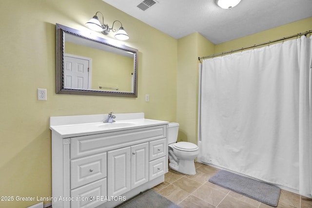 3650 Observatory Ln, Holt, MI 48842 - full bath with toilet, vanity, curtained shower, and tile patterned flooring
