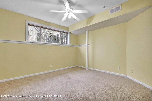 3650 Observatory Ln, Holt, MI 48842 - empty room featuring carpet flooring, a ceiling fan, and baseboards