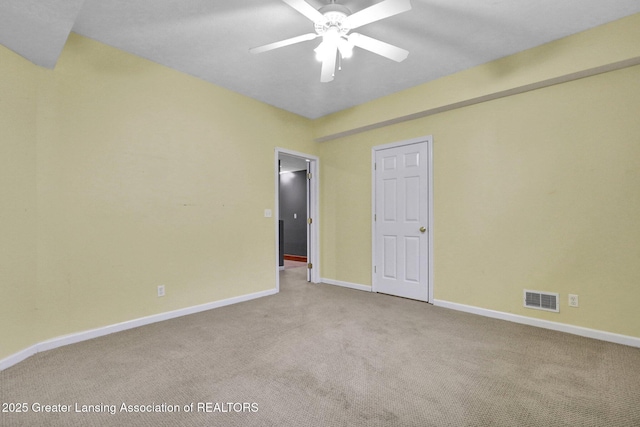 3650 Observatory Ln, Holt, MI 48842 - unfurnished room with carpet floors, ceiling fan, and baseboards