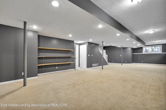 3650 Observatory Ln, Holt, MI 48842 - below grade area featuring light carpet, baseboards, and recessed lighting