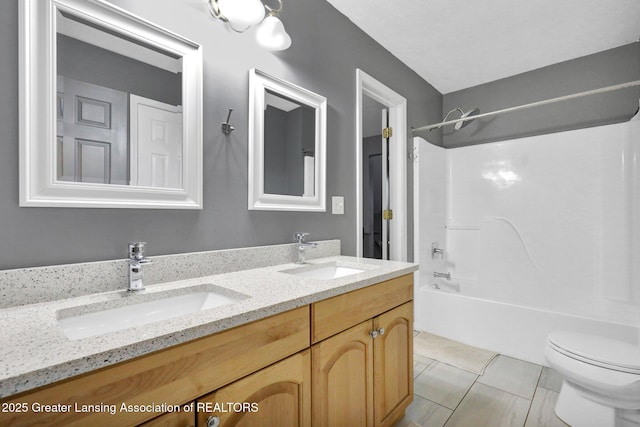 3650 Observatory Ln, Holt, MI 48842 - full bathroom with double vanity, toilet, shower / bath combination, and tile patterned flooring