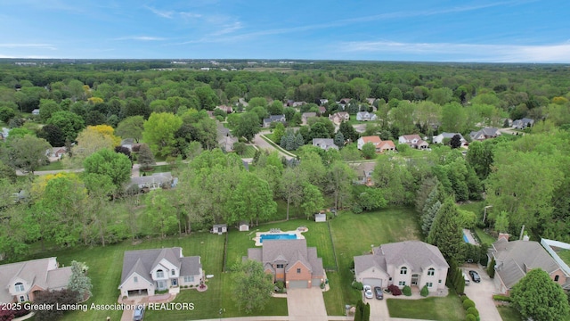3650 Observatory Ln, Holt, MI 48842 - aerial perspective of suburban area with a forest
