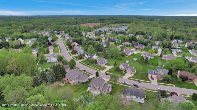 3650 Observatory Ln, Holt, MI 48842 - aerial view of property's location featuring a forest and nearby suburban area