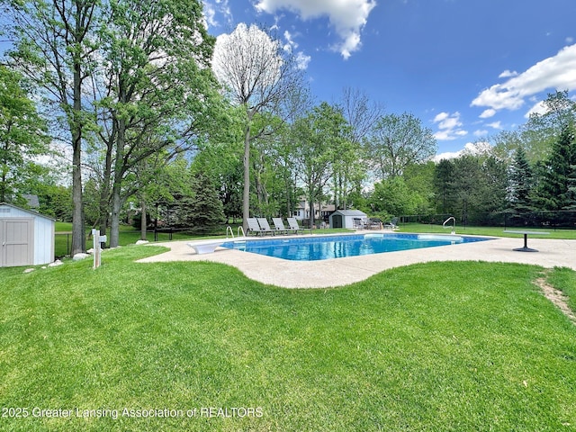 3650 Observatory Ln, Holt, MI 48842 - outdoor pool with a storage shed, an outdoor structure, and a yard