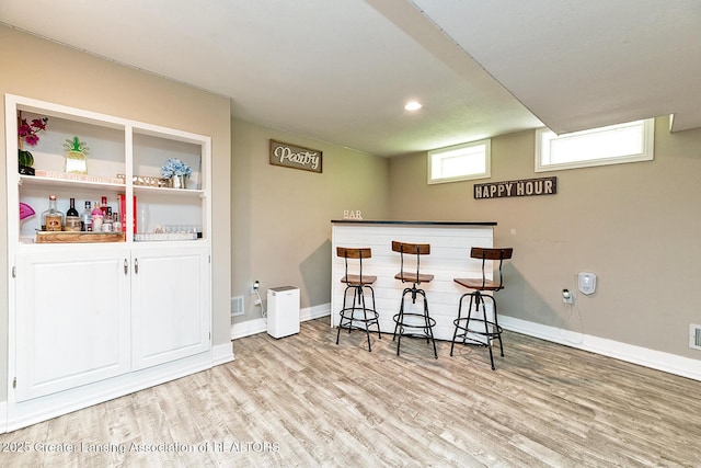 2531 Dillingham Ave, Lansing, MI 48906 - indoor dry bar with wood finished floors, baseboards, and recessed lighting