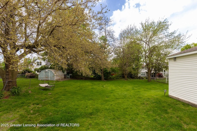 316 Union St, Grand Ledge, MI 48837 - view of yard with an outbuilding and a storage unit