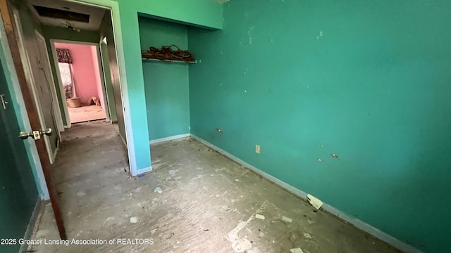 413 Meeker St, Leslie, MI 49251 - unfurnished bedroom with baseboards and a closet