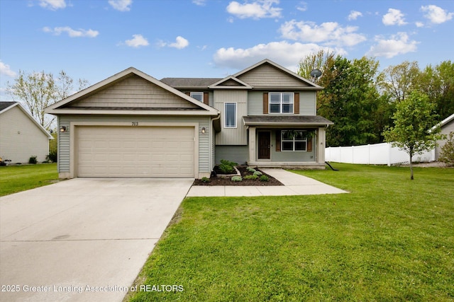 703 Josie Ln, Laingsburg, MI 48848 - view of front of property featuring an attached garage and driveway