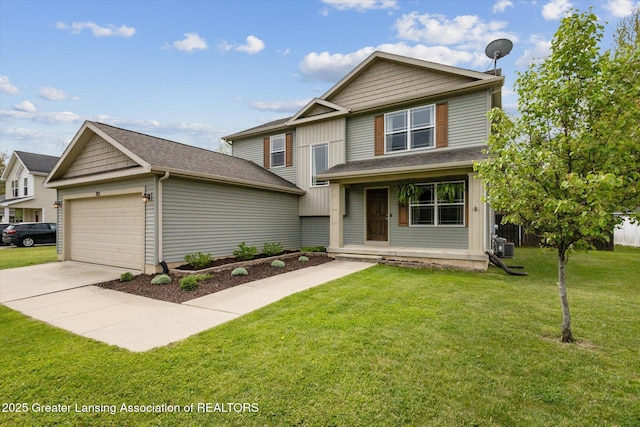 703 Josie Ln, Laingsburg, MI 48848 - view of front of property featuring a porch, an attached garage, concrete driveway, and a front lawn