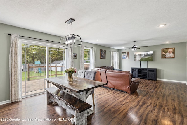 703 Josie Ln, Laingsburg, MI 48848 - dining room featuring dark wood-style flooring, baseboards, a textured ceiling, plenty of natural light, and recessed lighting