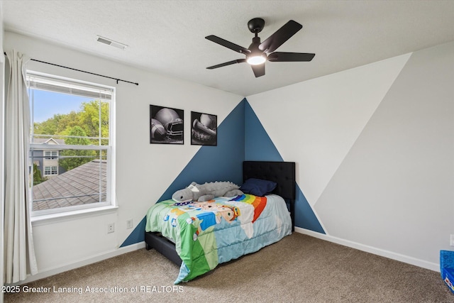 703 Josie Ln, Laingsburg, MI 48848 - bedroom featuring carpet flooring, baseboards, and ceiling fan