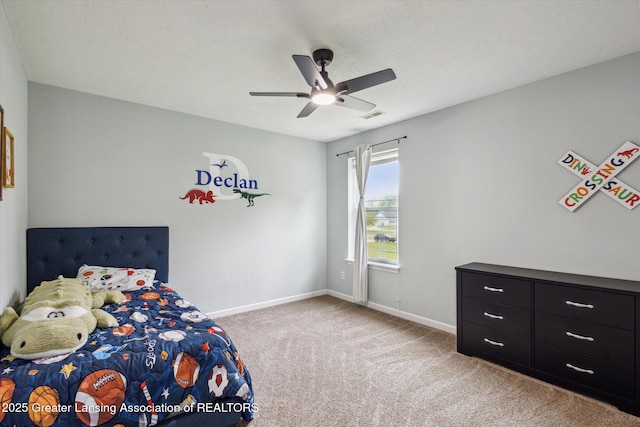 703 Josie Ln, Laingsburg, MI 48848 - bedroom featuring carpet floors, baseboards, and ceiling fan