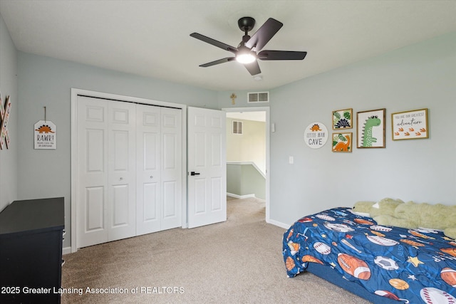 703 Josie Ln, Laingsburg, MI 48848 - bedroom featuring carpet flooring, a closet, ceiling fan, and baseboards