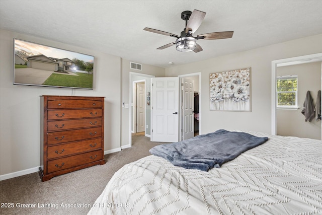 703 Josie Ln, Laingsburg, MI 48848 - bedroom featuring carpet, baseboards, ceiling fan, and a spacious closet