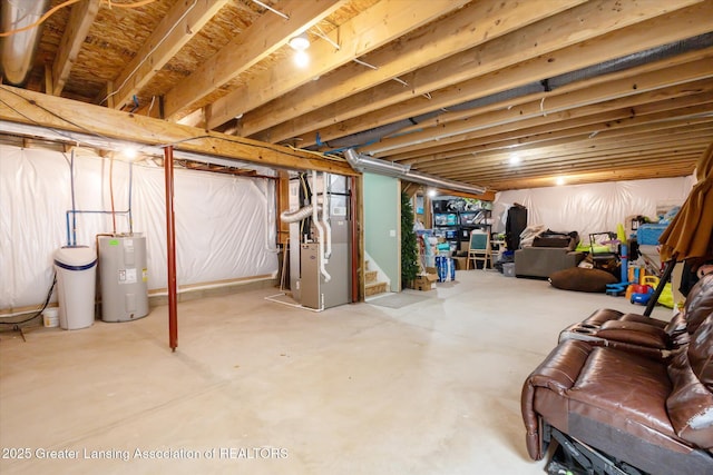 703 Josie Ln, Laingsburg, MI 48848 - unfinished basement featuring heating unit, electric water heater, and stairs