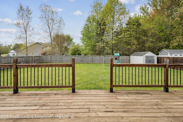 703 Josie Ln, Laingsburg, MI 48848 - wooden deck featuring a shed and an outbuilding