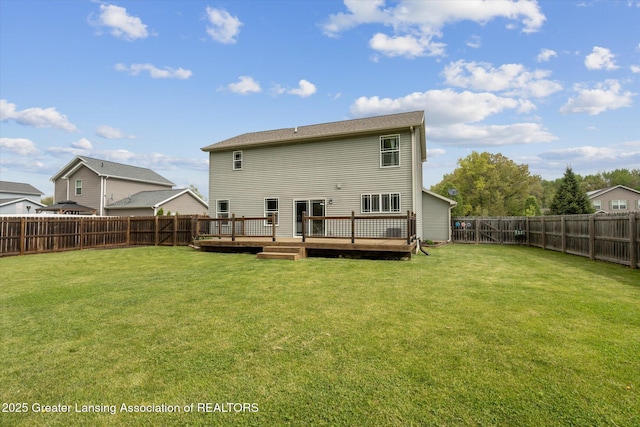 703 Josie Ln, Laingsburg, MI 48848 - back of property with a deck