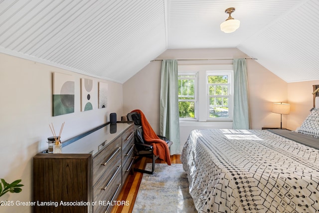 1038 Morgan St, Lansing, MI 48912 - bedroom featuring wood finished floors and vaulted ceiling