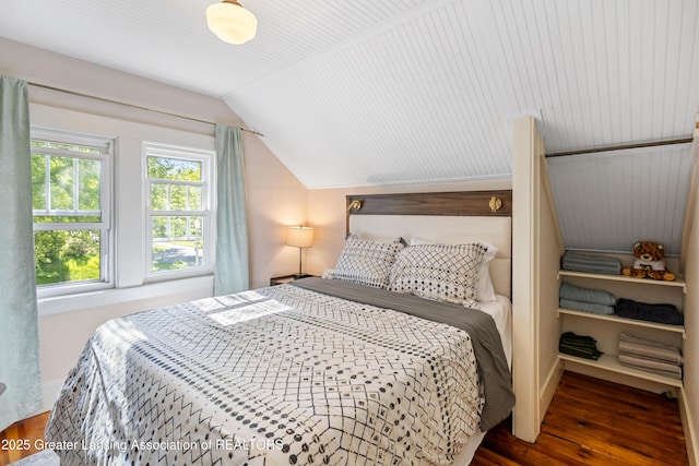 1038 Morgan St, Lansing, MI 48912 - bedroom with vaulted ceiling and wood finished floors