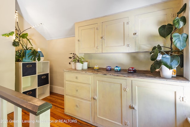 1038 Morgan St, Lansing, MI 48912 - detailed view of wood finished floors and baseboards