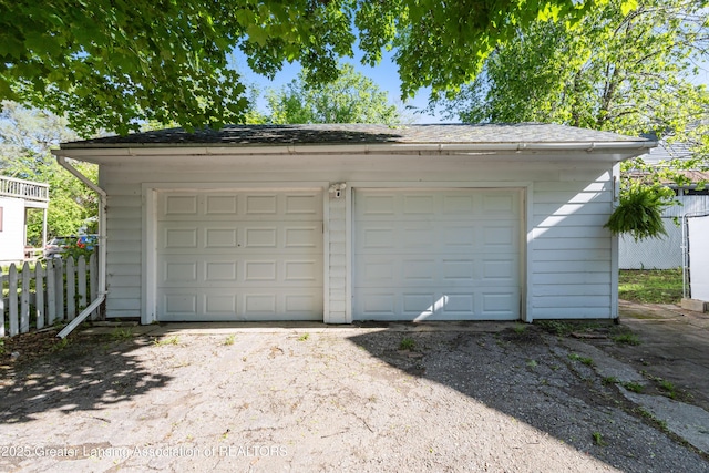 1038 Morgan St, Lansing, MI 48912 - detached garage with fence